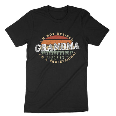Black Im Not Retired Im A Professional Grandma T-Shirt#color_black