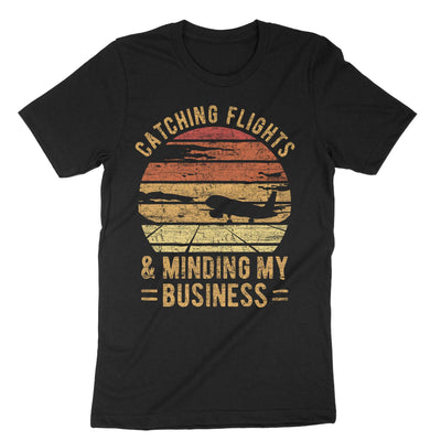 Black Catching Flights And Minding My Business T-Shirt#color_black